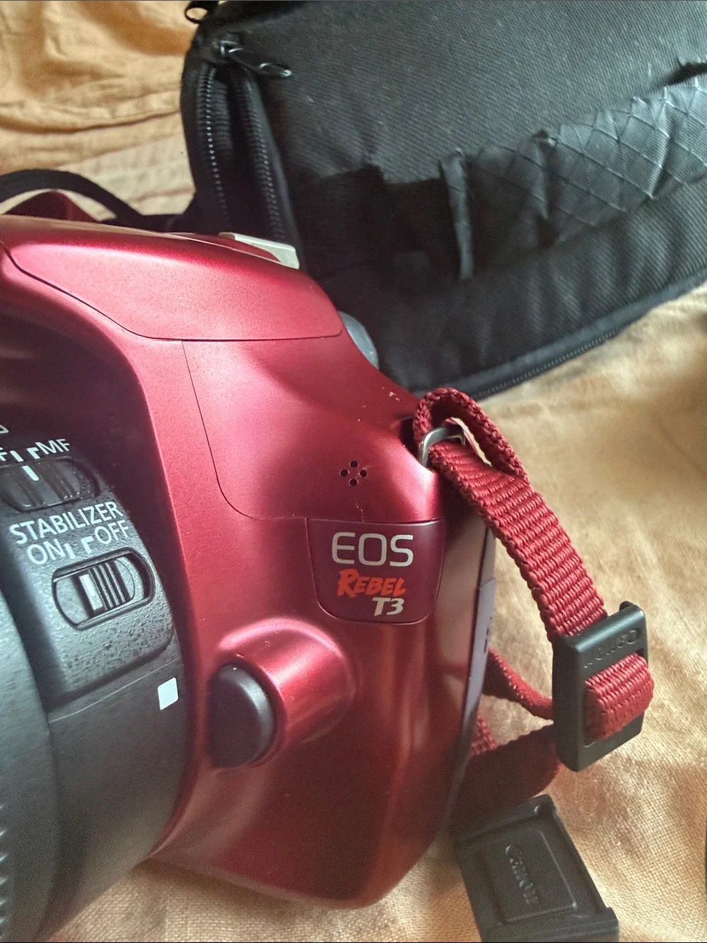 Canon Red DSLR Camera with Standard Zoom Lens